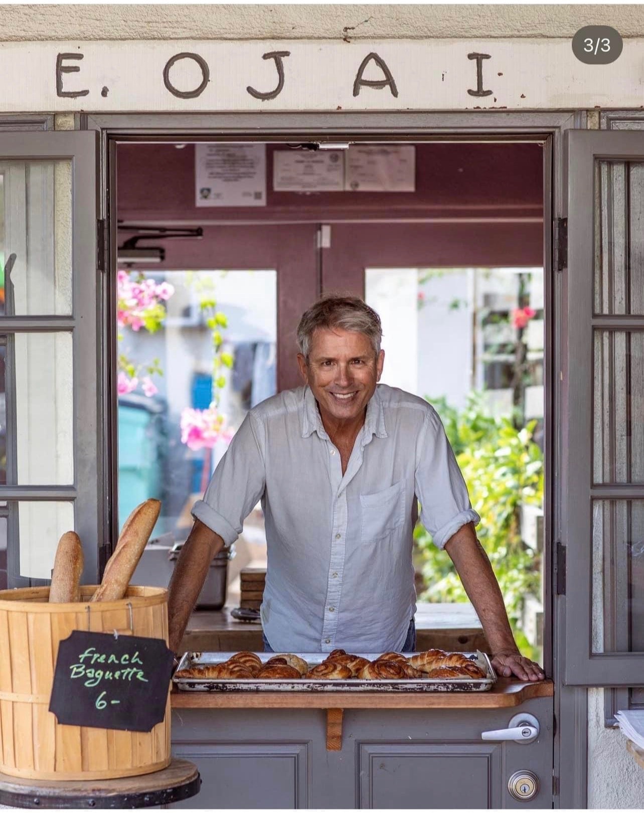 Claud Mann at the bakery window, E. Ojai